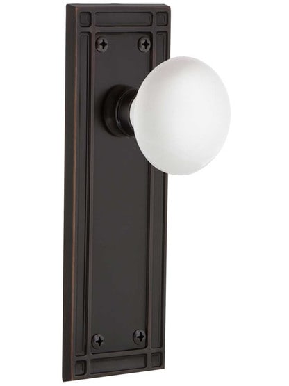 Mission Door Set with White Porcelain Knobs in Timeless Bronze.